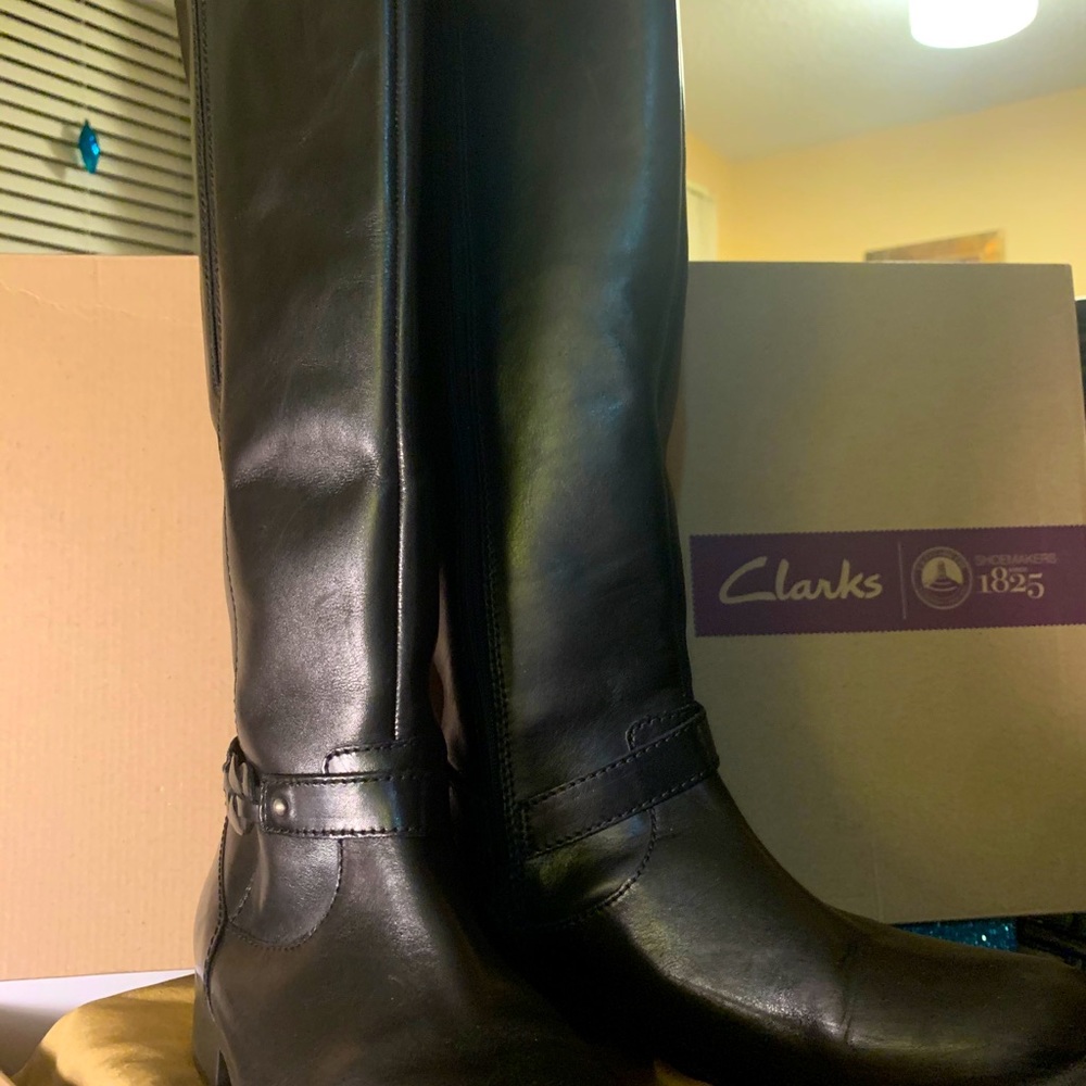 Clark Ladies knee-high boots with treads soles